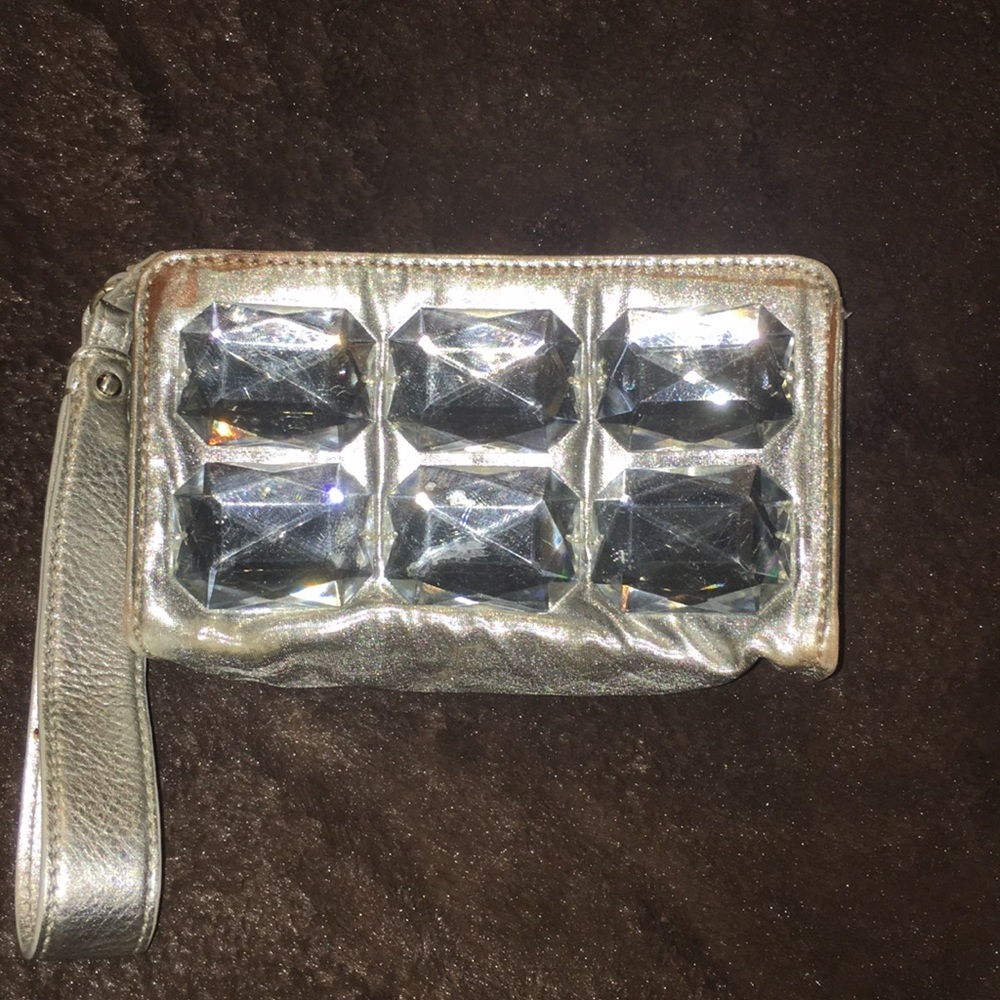 Original Stuart Weitzman mini wristlet.